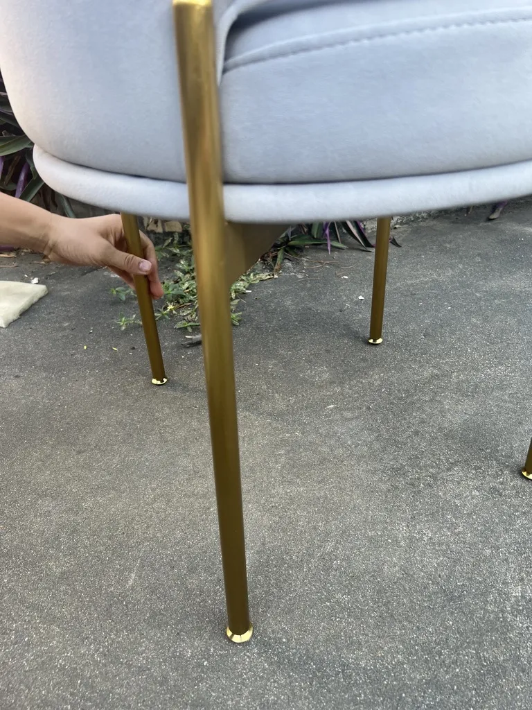Close-up of a titanium-gold stainless steel leg and foot