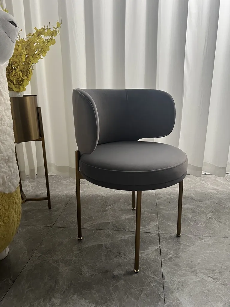 Model 22205 in grey velvet with titanium-gold stainless steel legs