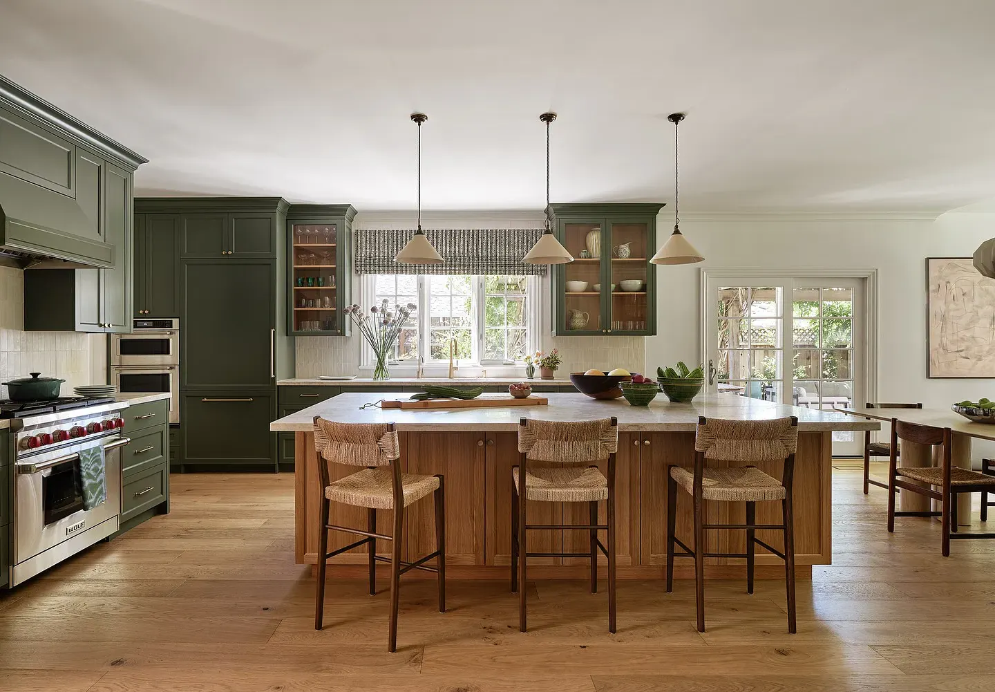 Woven stools around a kitchen island — illustrative lifestyle scene