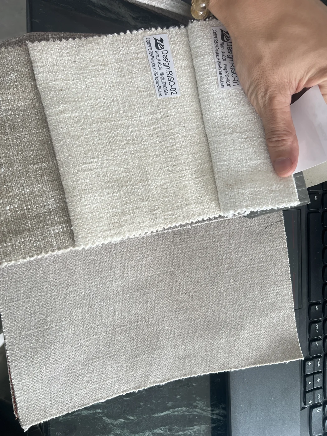 Upholstery swatches photographed during the project